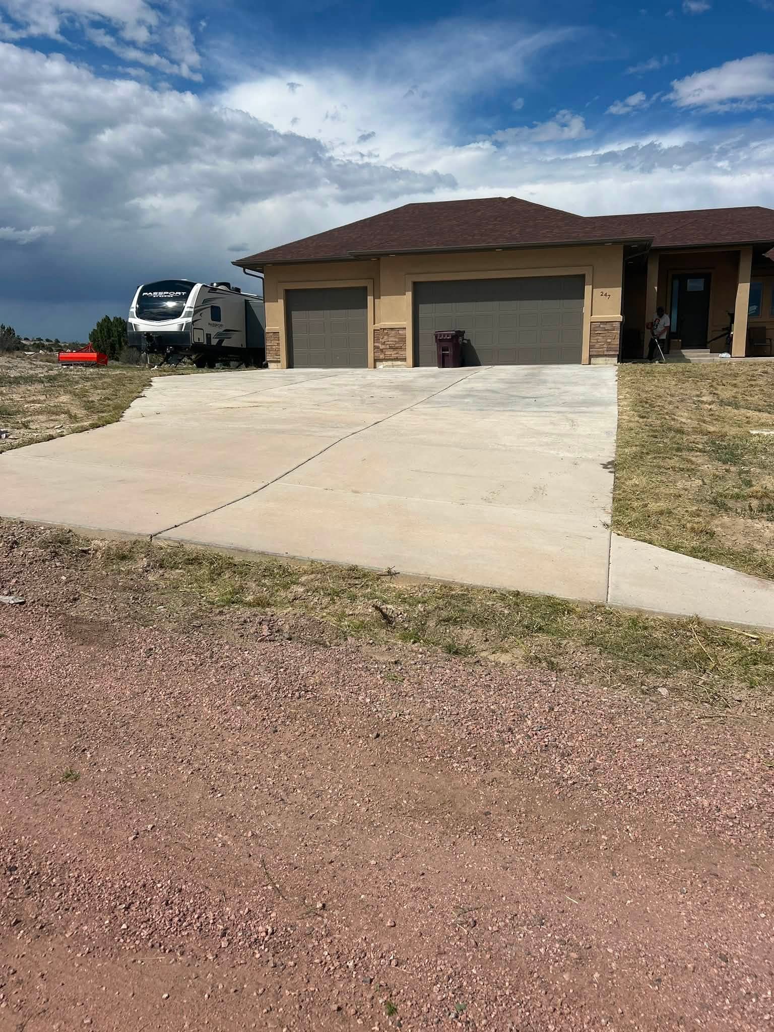 New concrete driveway and apron installation