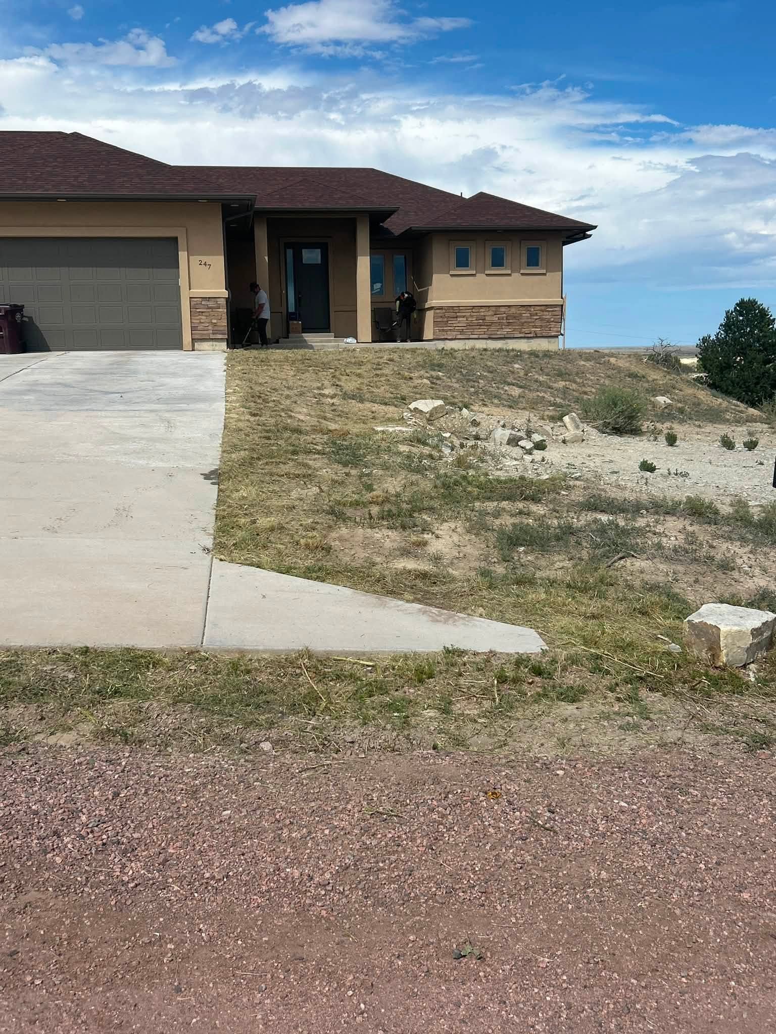 Newly poured concrete driveway approach